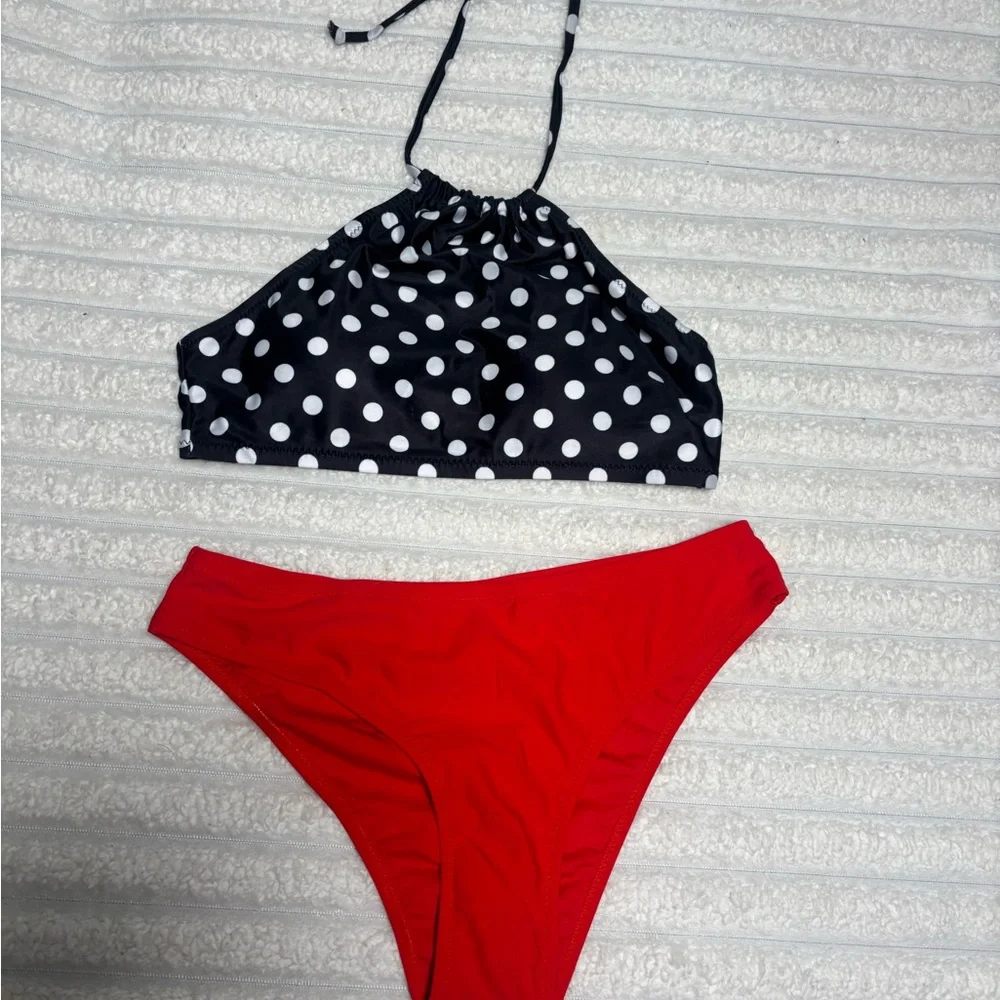Stylish Polka Dot Bikini Top with Vibrant Red Bottoms